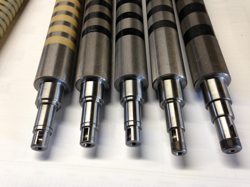 Recovered folder rollers lined up for production